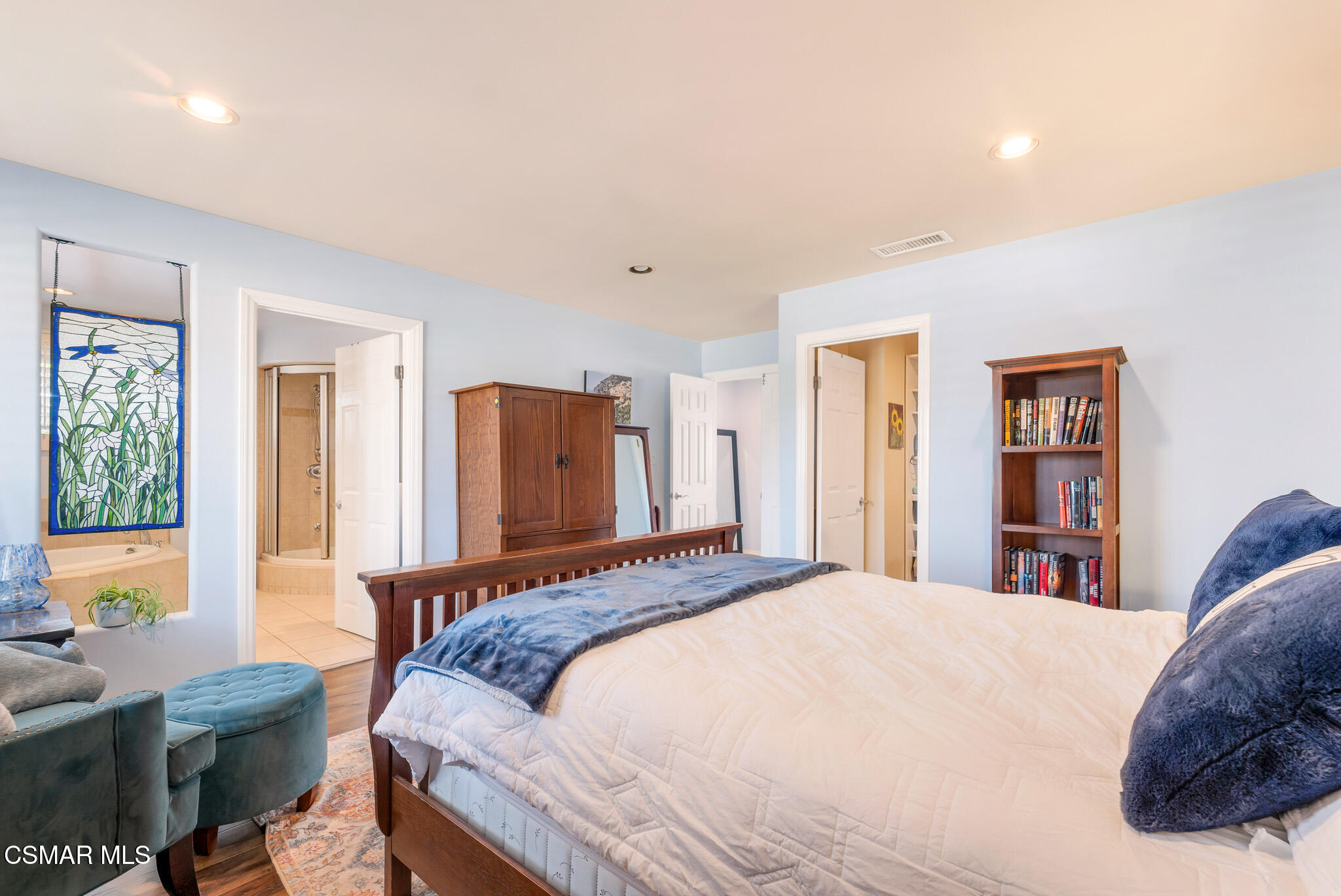 3037 Divernon Avenue Simi Valley, CA 93063 - Photo 32 of 44 a bedroom with a large bed and a window