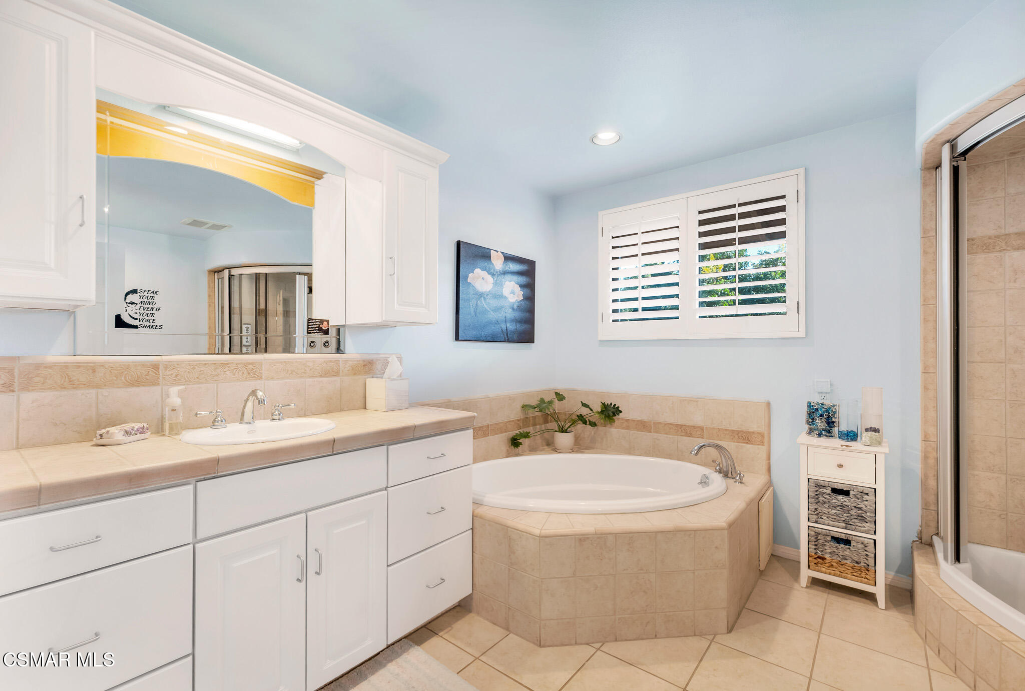 3037 Divernon Avenue Simi Valley, CA 93063 - Photo 33 of 44 a bathroom with a tub sink and mirror