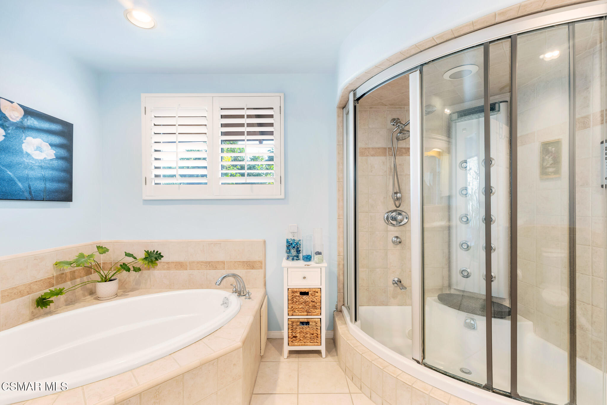 3037 Divernon Avenue Simi Valley, CA 93063 - Photo 34 of 44 a bathroom with a bathtub and a sink