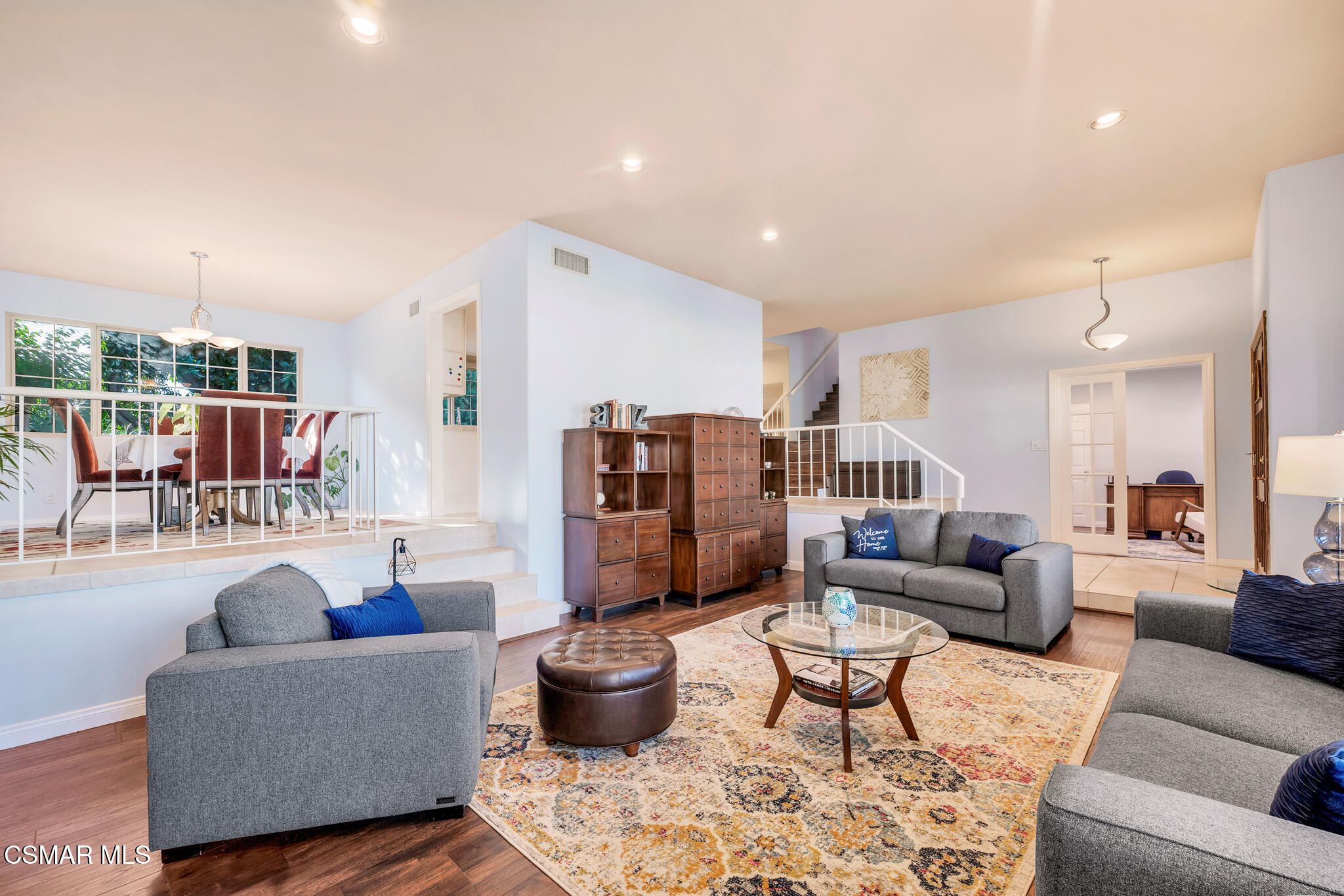 3037 Divernon Avenue Simi Valley, CA 93063 - Photo 4 of 44 a living room with furniture and a book shelf