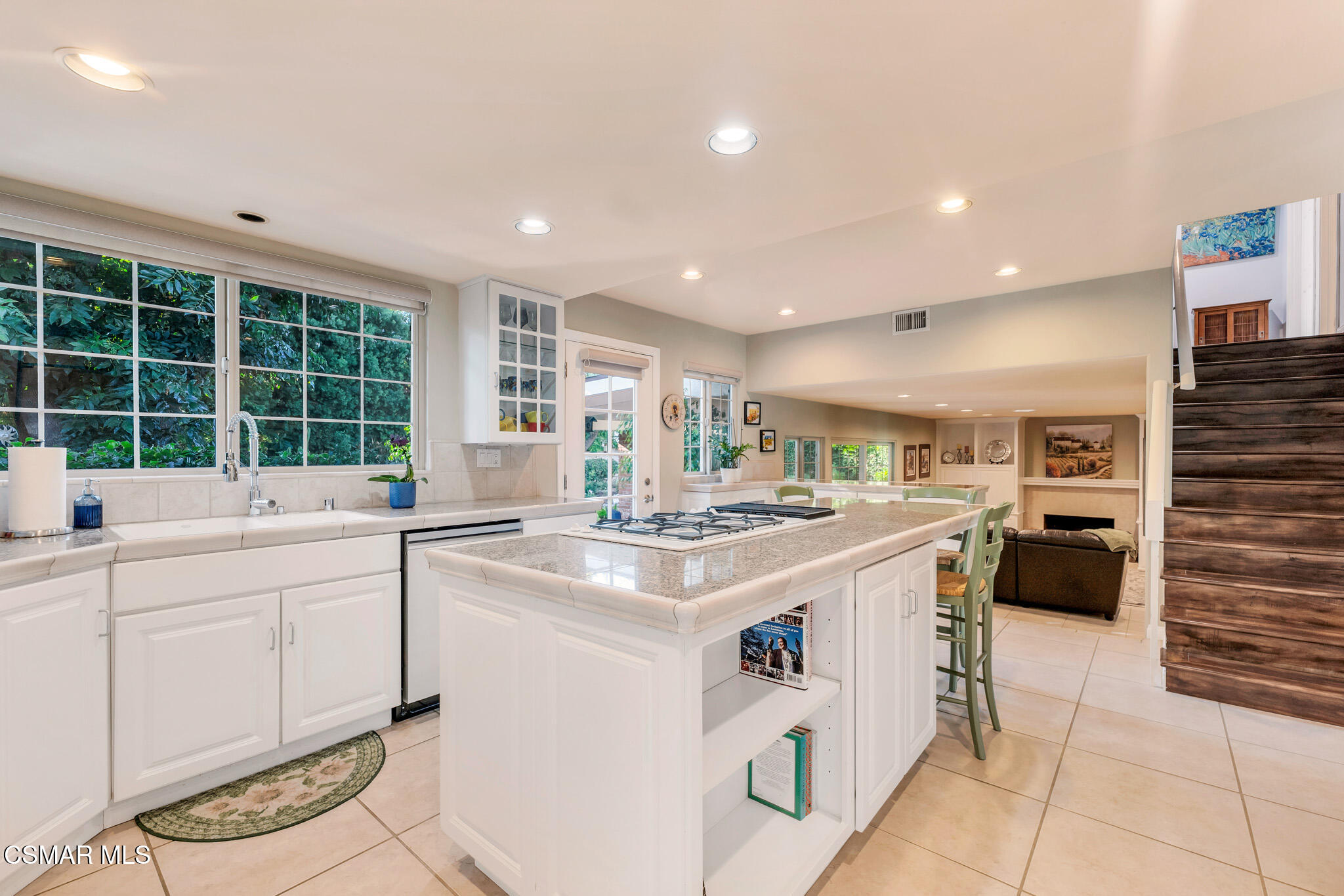 3037 Divernon Avenue Simi Valley, CA 93063 - Photo 9 of 44 a kitchen with a stove and a sink