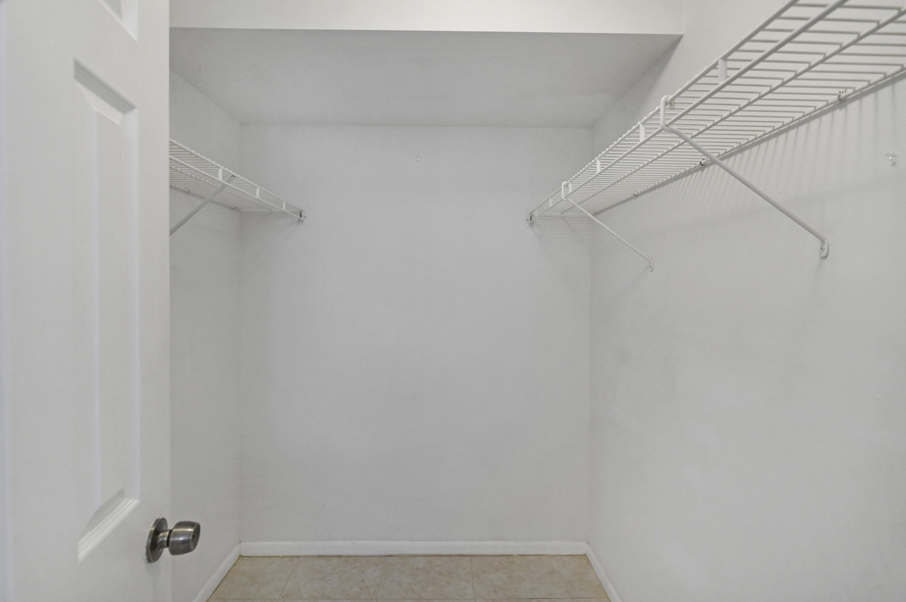 5500 Northwest 2nd Avenue, Unit 719 Boca Raton, FL 33487 - Photo 13 of 22 Master Bedroom Walk-In Closet