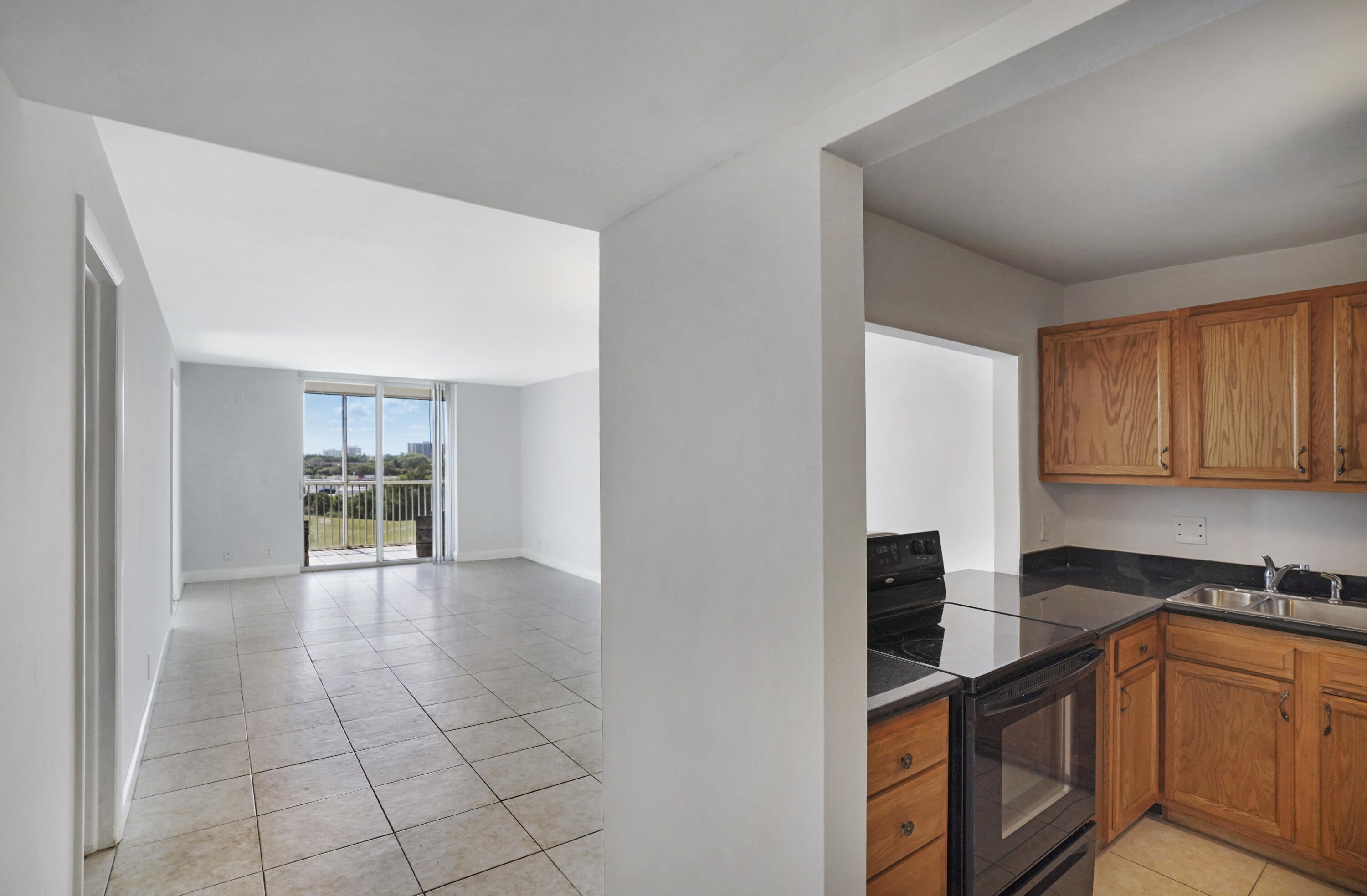 5500 Northwest 2nd Avenue, Unit 719 Boca Raton, FL 33487 - Photo 2 of 22 Open Plan Kitchen / Living Room