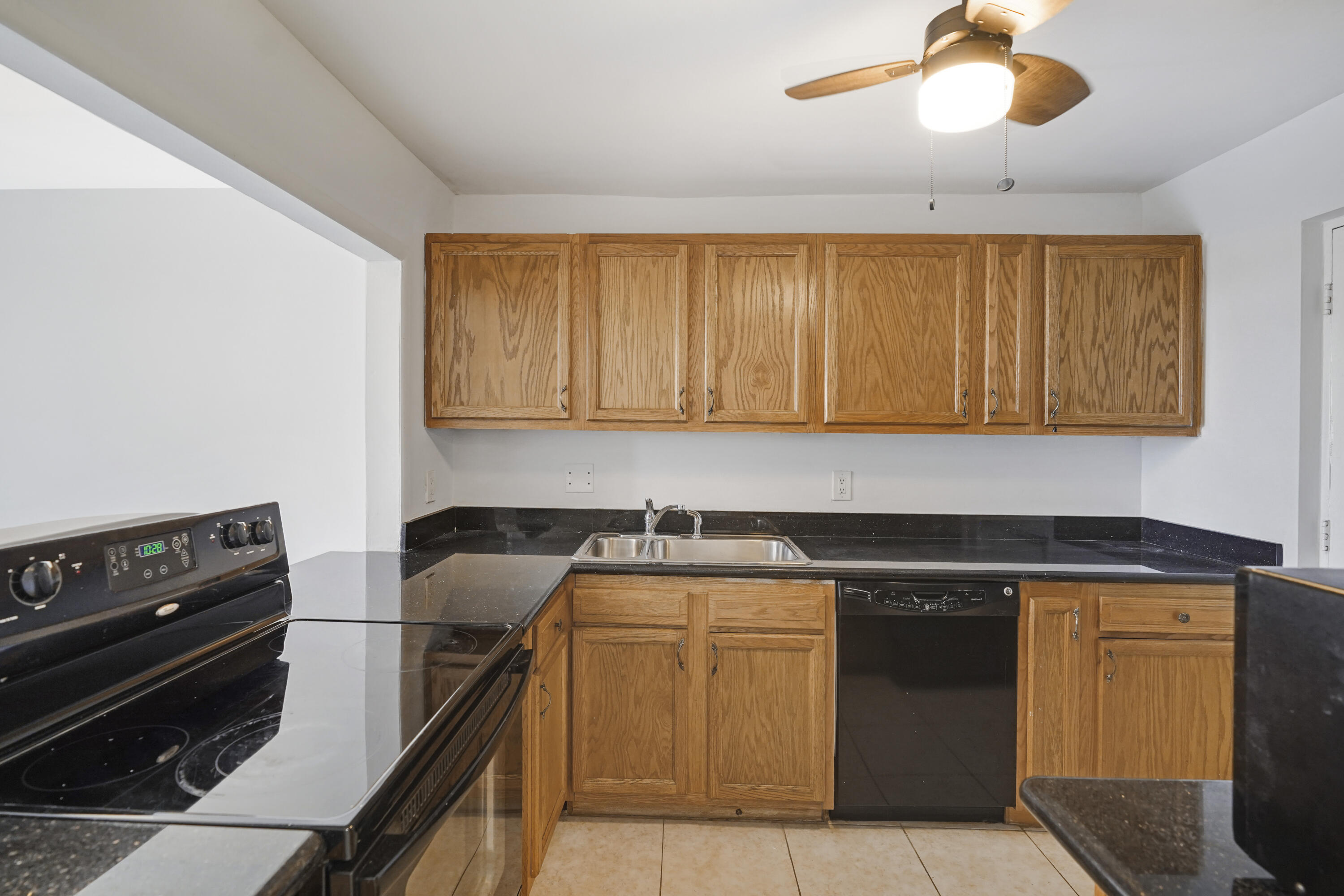 5500 Northwest 2nd Avenue, Unit 719 Boca Raton, FL 33487 - Photo 3 of 22 Kitchen with Granite Countertop