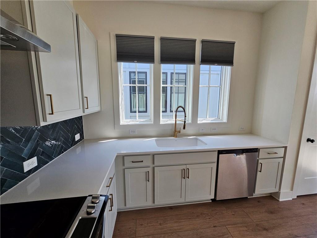 1294 Longreen Terrace Northwest, Unit 2 Atlanta, GA 30318 - Photo 16 of 25 a kitchen with a sink and a window