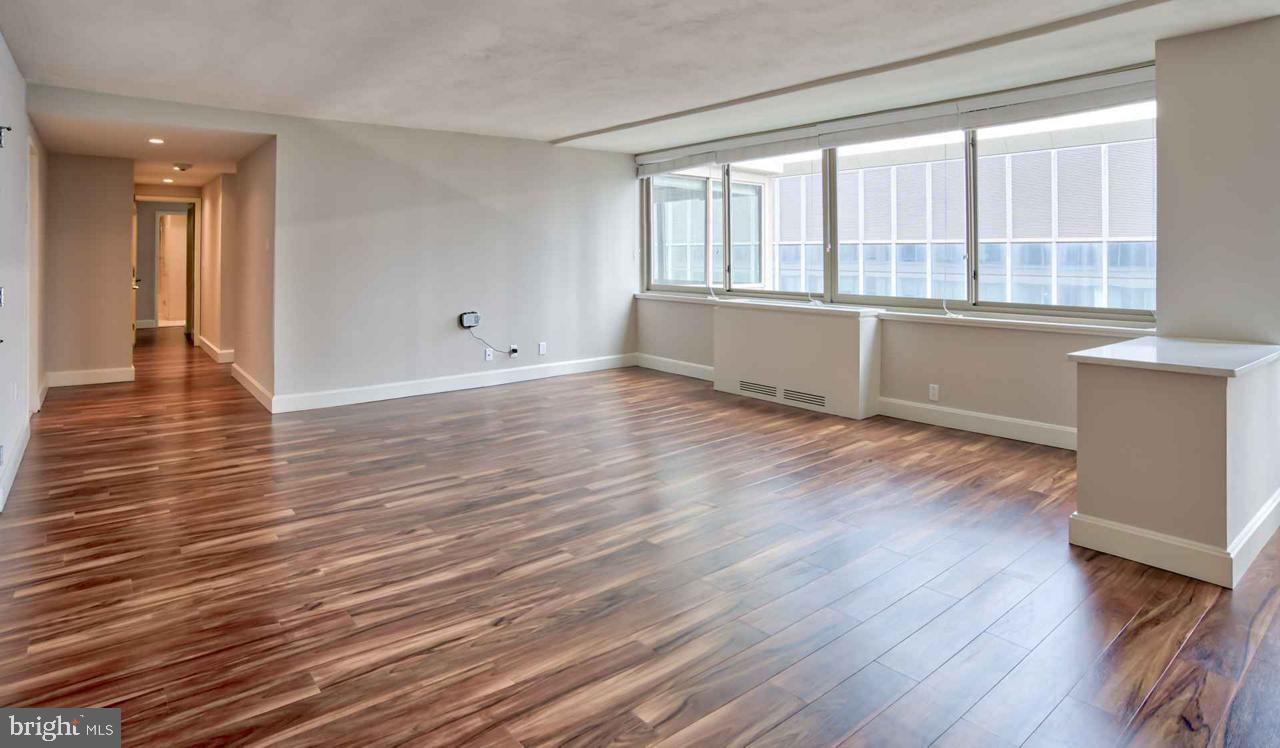 1815 John F Kennedy Boulevard, Unit 3B2908 Philadelphia, PA 19103 - Photo 15 of 15 wooden floor in an empty room with a window