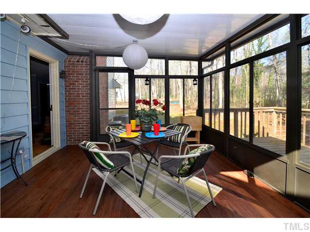 4308 Holly Run Road Apex, NC 27539 - Photo 17 of 18 PERFECT SCREEN PORCH FOR ENTERTAINING AND RELAXING