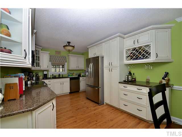 4308 Holly Run Road Apex, NC 27539 - Photo 7 of 18 ALL NEW KITCHEN WITH GRANITE COUNTERS, LOADS OF GORGEOUS CABINETS AND STAINLESS APPLIANCES