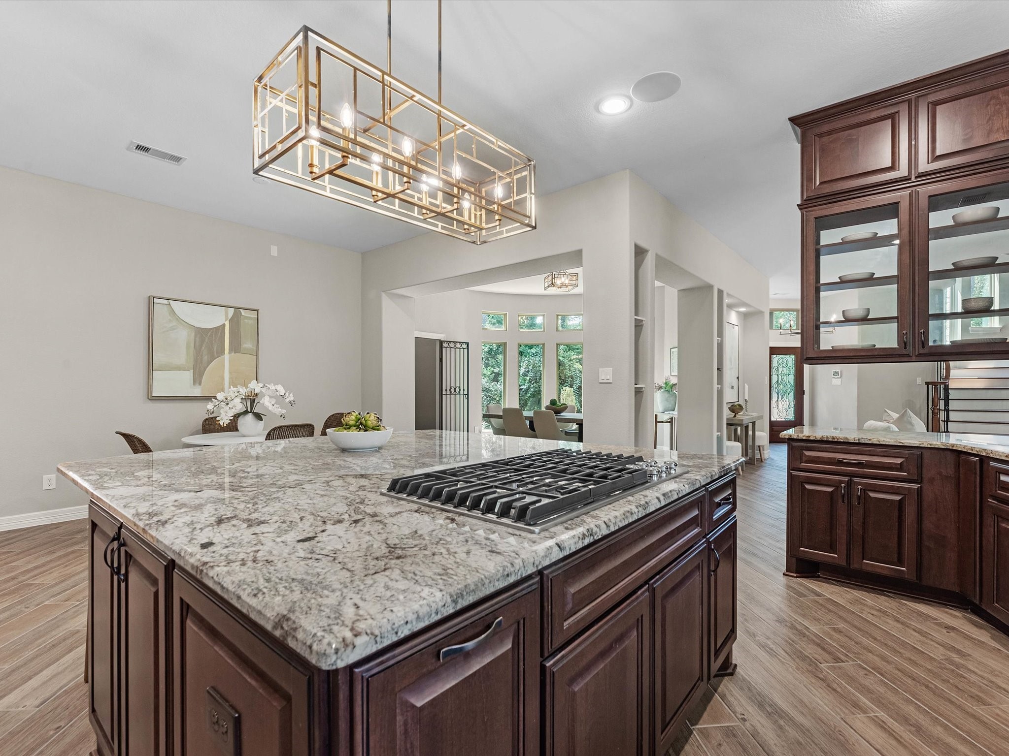 19332 Chateau Ridge Court Tomball, TX 77377 - Photo 14 of 50 a kitchen with stainless steel appliances granite countertop stove top oven and refrigerator