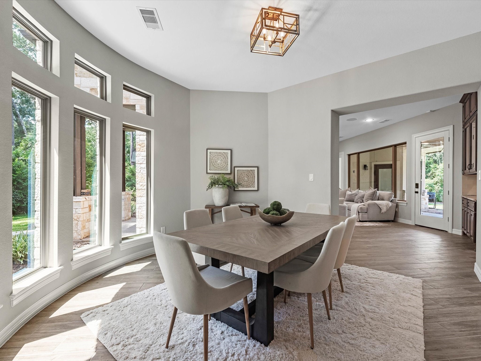19332 Chateau Ridge Court Tomball, TX 77377 - Photo 18 of 50 a view of a dining room with furniture window and wooden floor