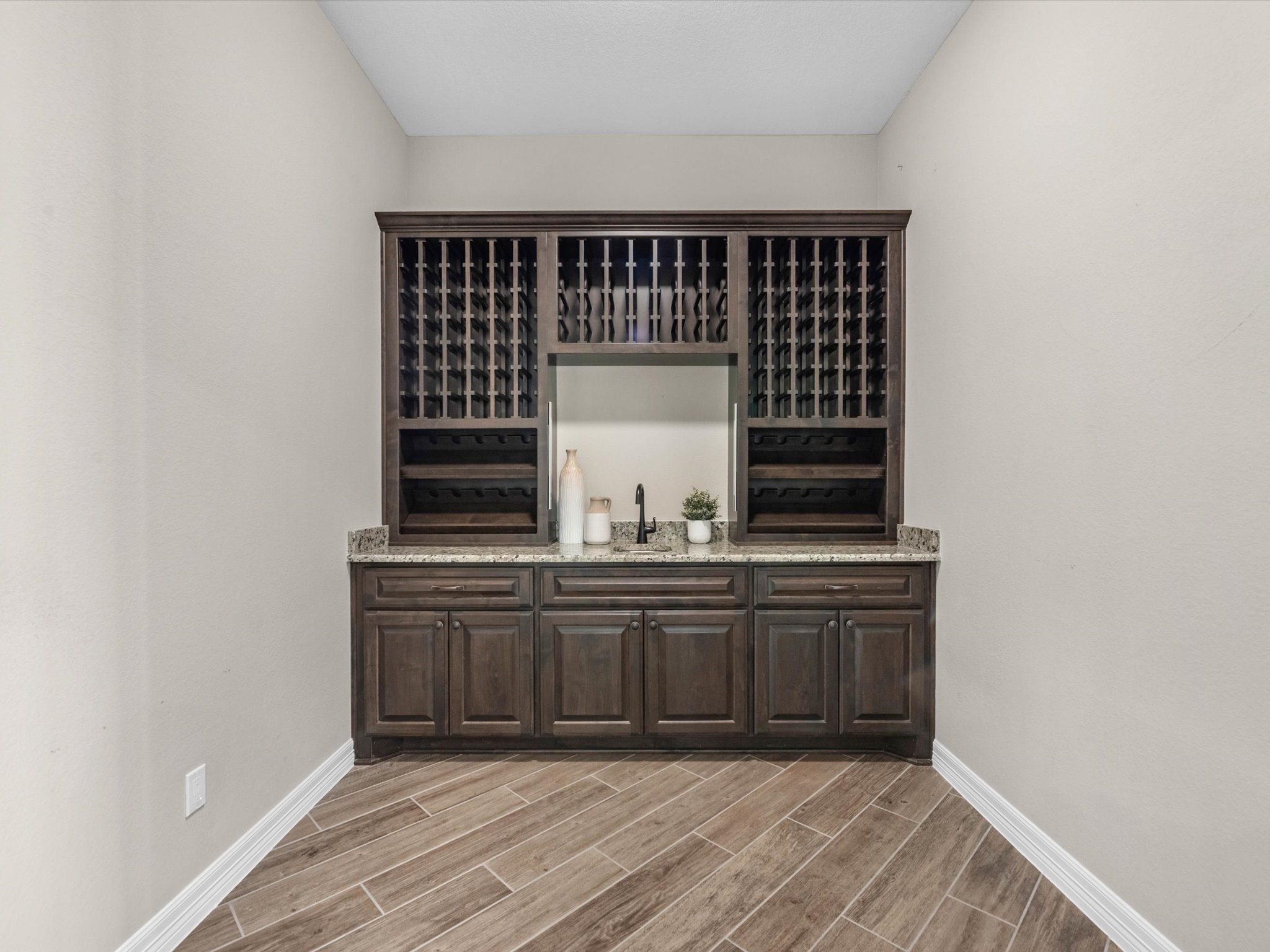 19332 Chateau Ridge Court Tomball, TX 77377 - Photo 19 of 50 a view of kitchen with granite countertop cabinets and sink