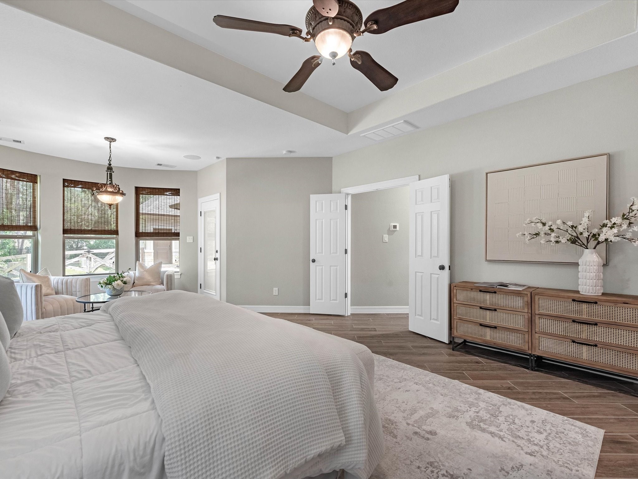 19332 Chateau Ridge Court Tomball, TX 77377 - Photo 21 of 50 a spacious bedroom with a bed and ceiling fan