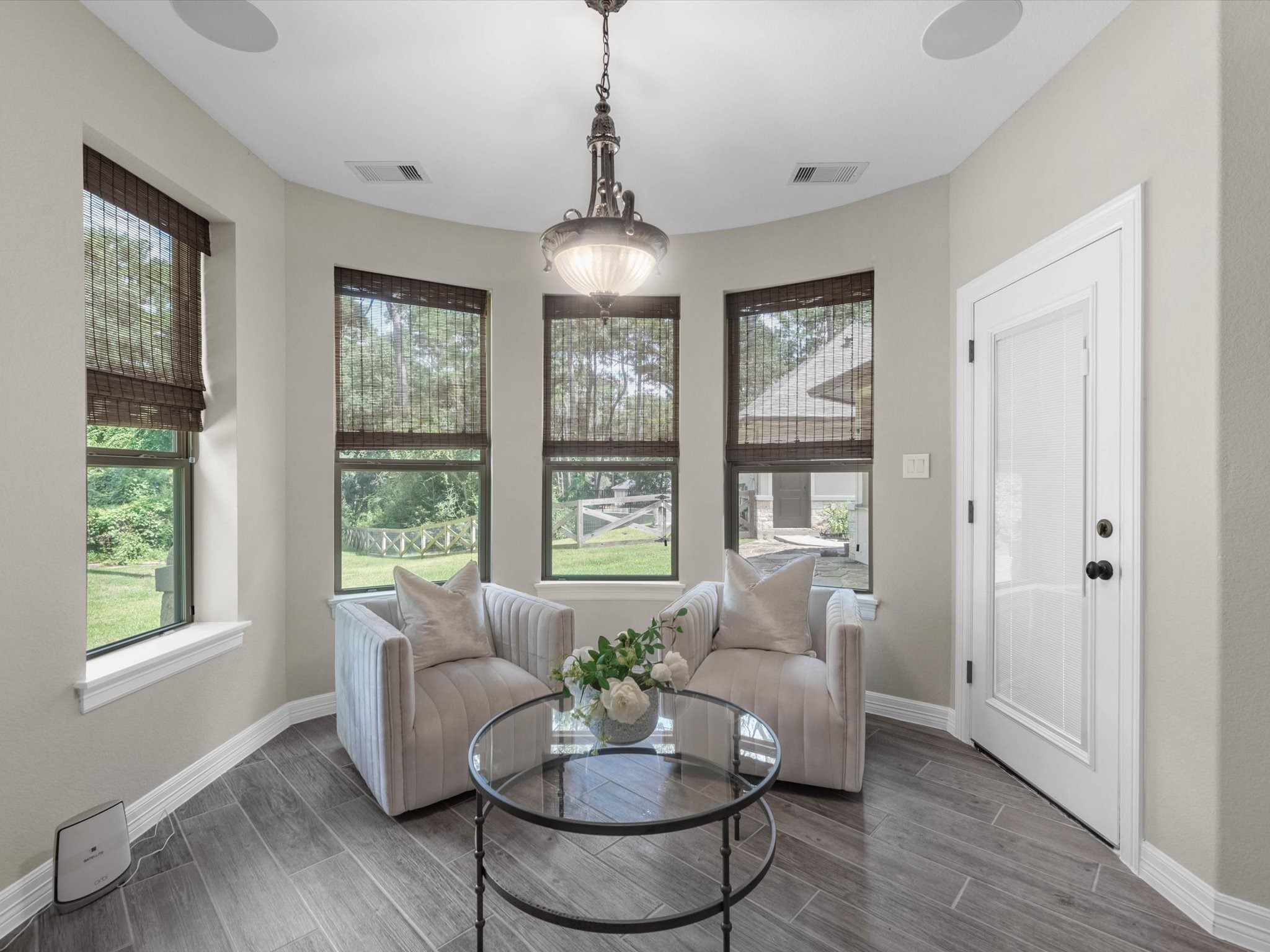 19332 Chateau Ridge Court Tomball, TX 77377 - Photo 23 of 50 a living room with furniture and a chandelier