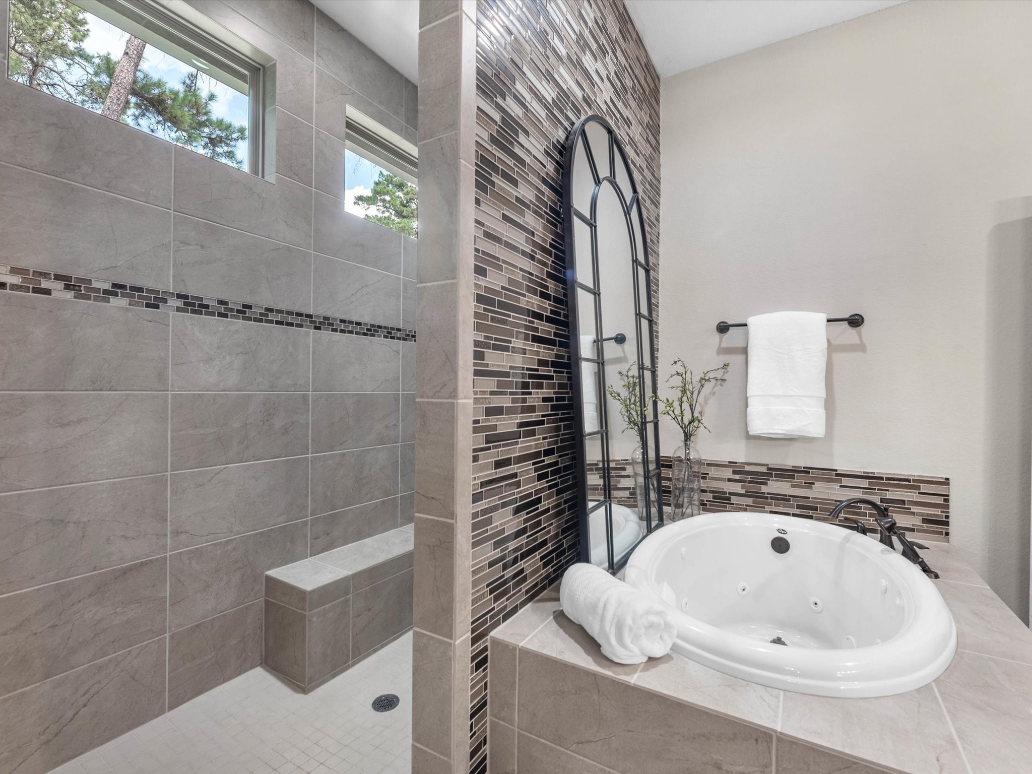 19332 Chateau Ridge Court Tomball, TX 77377 - Photo 27 of 50 a bathroom with a sink and mirror