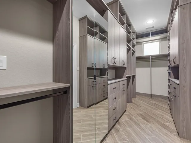 a kitchen with a sink and refrigerator