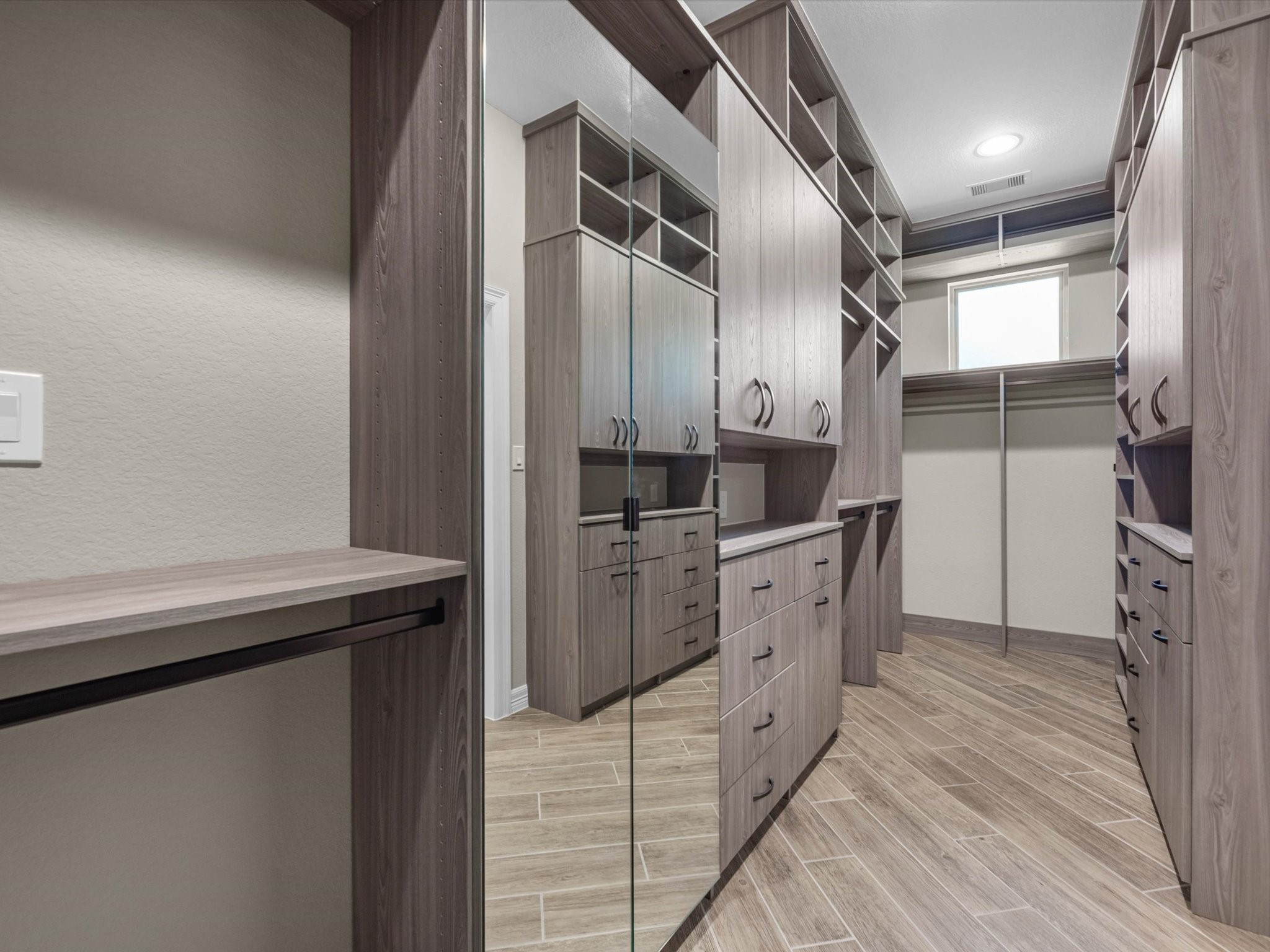 19332 Chateau Ridge Court Tomball, TX 77377 - Photo 28 of 50 a kitchen with a sink and refrigerator