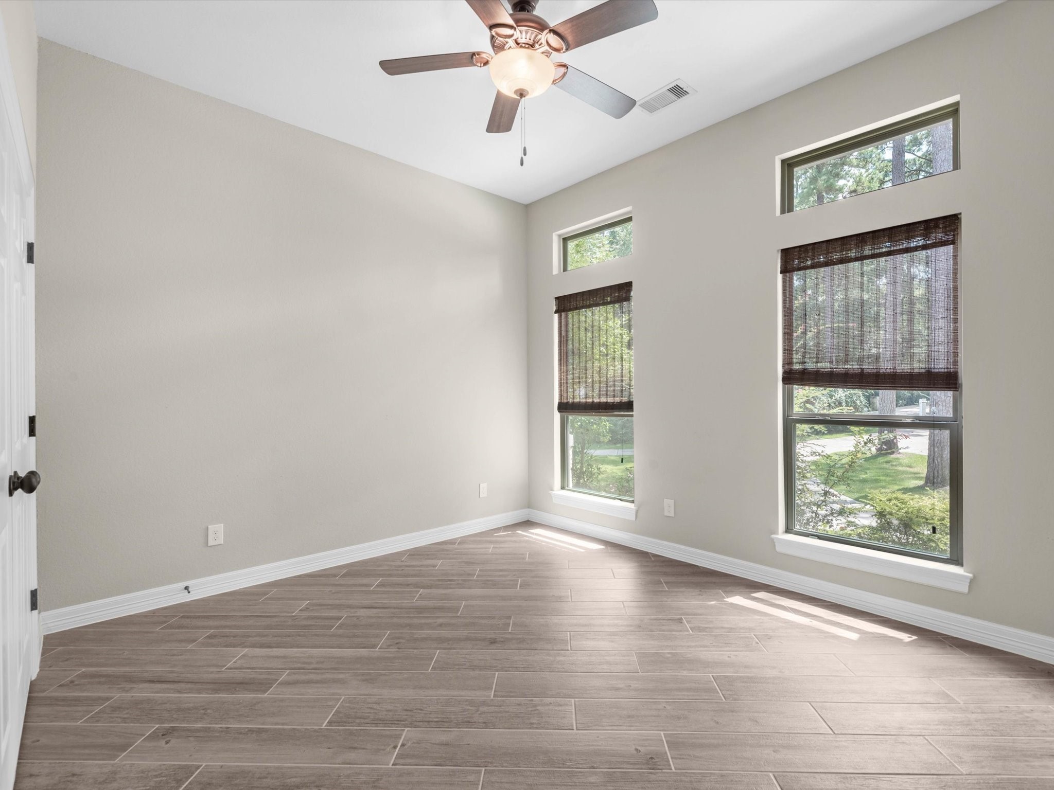 19332 Chateau Ridge Court Tomball, TX 77377 - Photo 31 of 50 a view of an empty room with a window