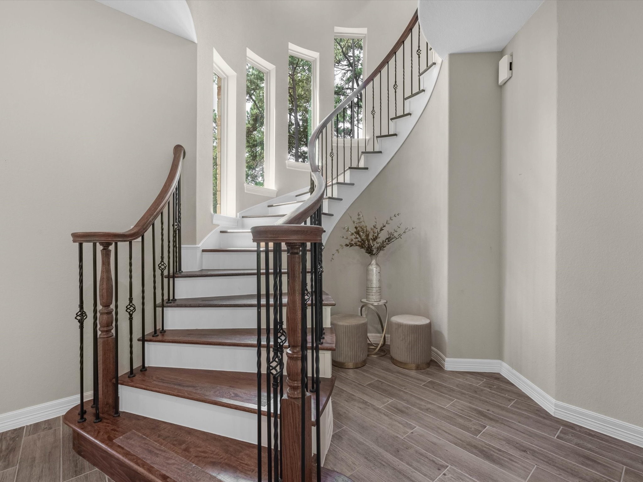 19332 Chateau Ridge Court Tomball, TX 77377 - Photo 33 of 50 a view of entryway with wooden floor and stairs
