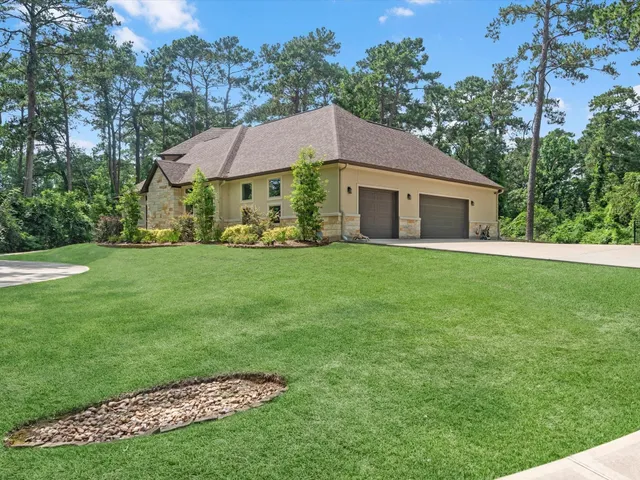 a view of a house with a garden
