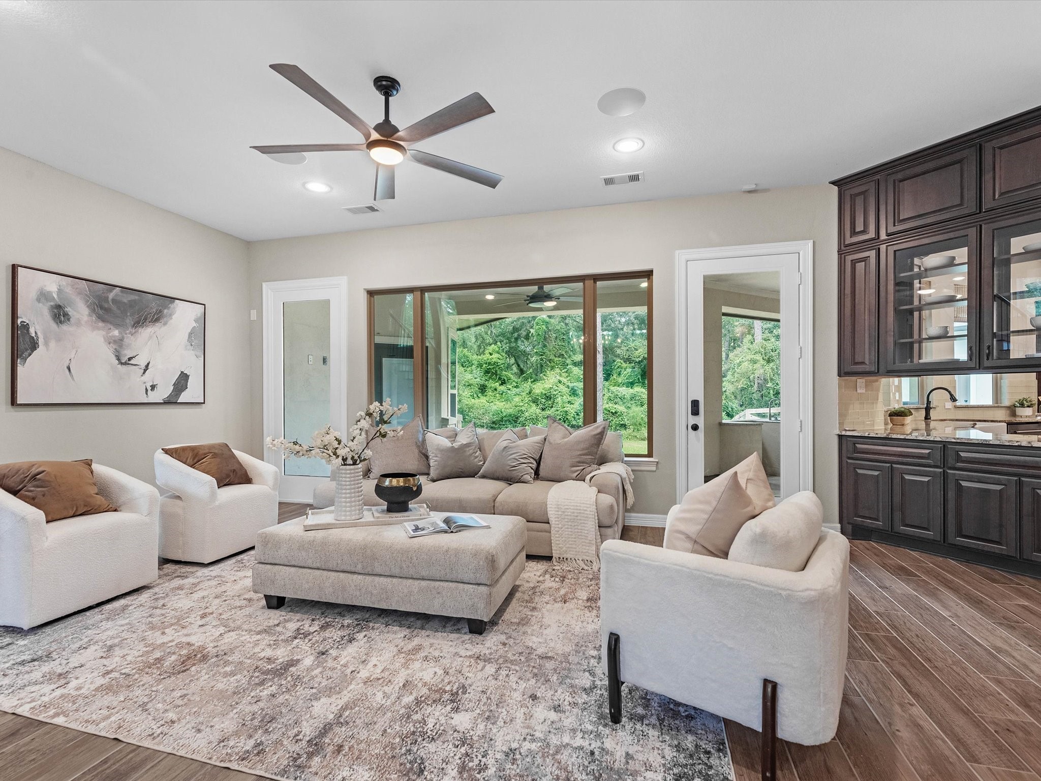 19332 Chateau Ridge Court Tomball, TX 77377 - Photo 9 of 50 a living room with furniture and floor to ceiling windows