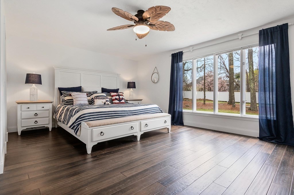 18 Durham Drive Lynnfield, MA 01940 - Photo 11 of 35 a bedroom with bed and wooden floor