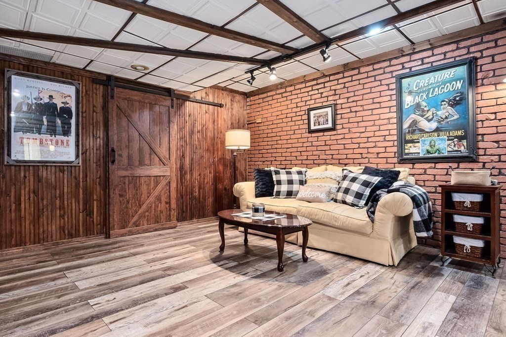 18 Durham Drive Lynnfield, MA 01940 - Photo 21 of 35 a living room with furniture and a wooden floor