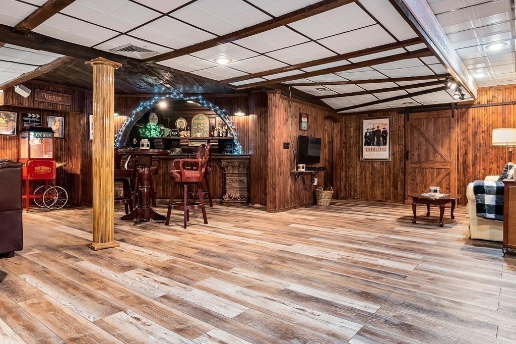 18 Durham Drive Lynnfield, MA 01940 - Photo 23 of 35 a view of a chairs and table in a patio