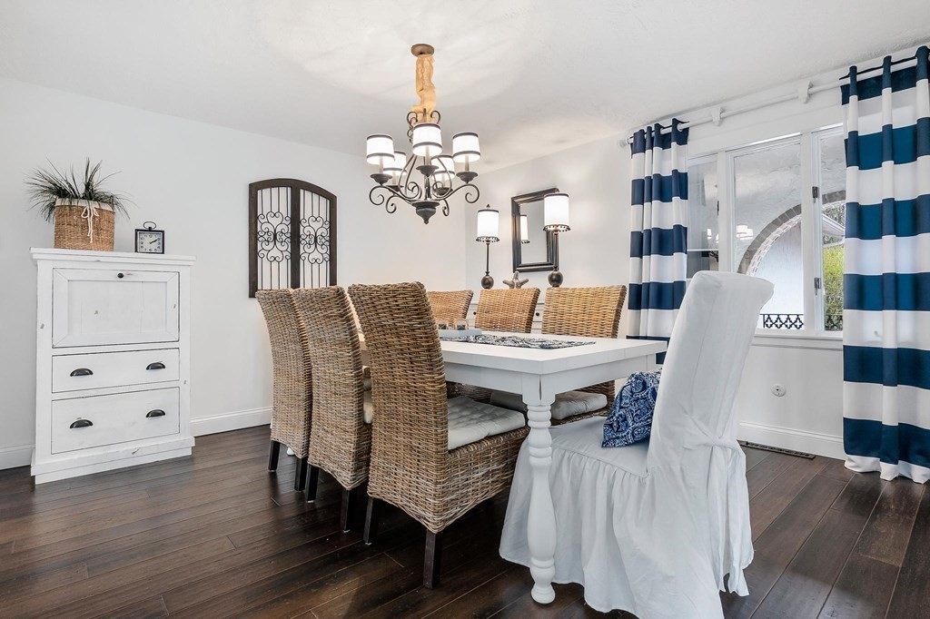 18 Durham Drive Lynnfield, MA 01940 - Photo 4 of 35 a dining room with furniture a chandelier and wooden floor