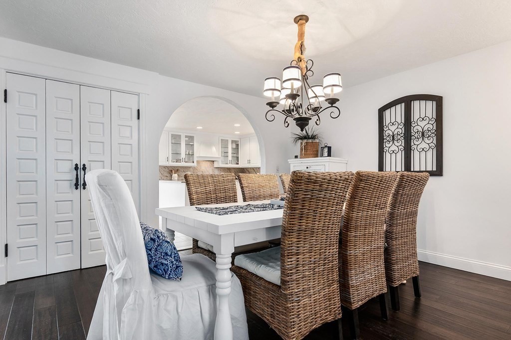 18 Durham Drive Lynnfield, MA 01940 - Photo 5 of 35 a view of a dining room with furniture and wooden floor