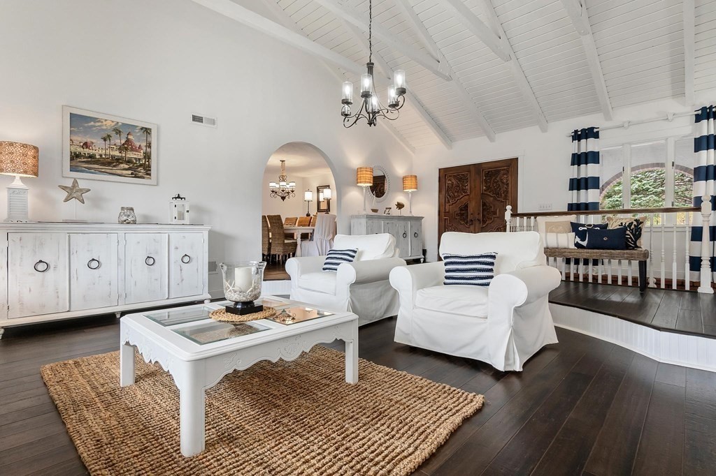 18 Durham Drive Lynnfield, MA 01940 - Photo 9 of 35 a living room with furniture a chandelier and a flat screen tv