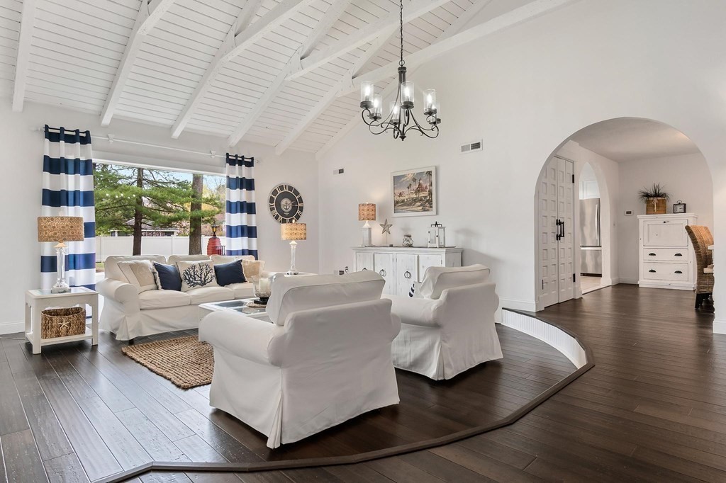 18 Durham Drive Lynnfield, MA 01940 - Photo 10 of 35 a living room with furniture or chandelier and a wooden floor