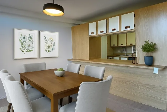 a view of a dining room with furniture