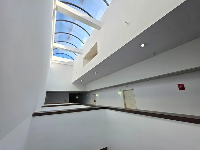 a view of a hallway with entryway