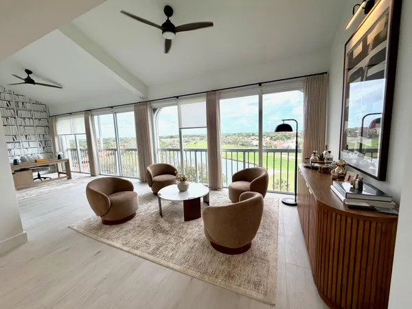 a large room with table and chairs