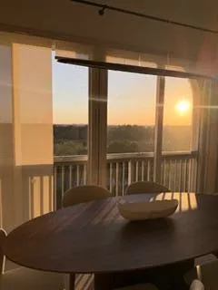 a view of a balcony filled with furniture