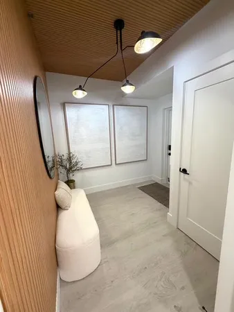 a view of a livingroom with furniture