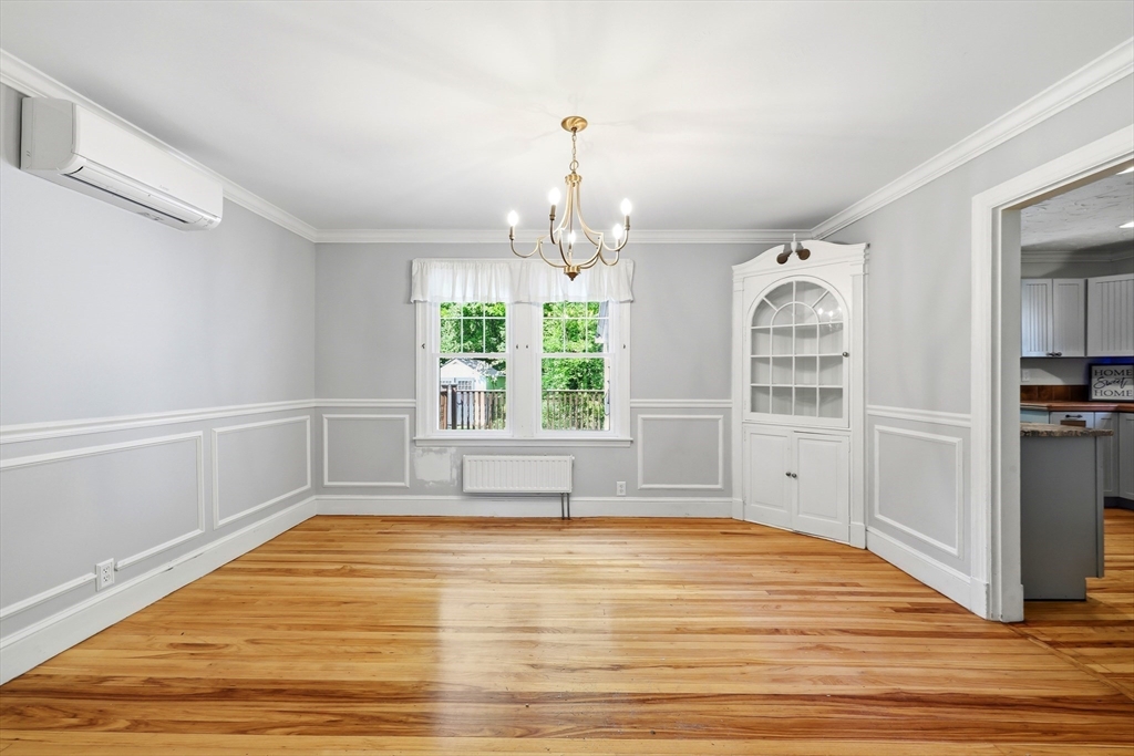 32 Lincoln Road Longmeadow, MA 01106 - Photo 13 of 36 a view of empty room with window and wooden floor