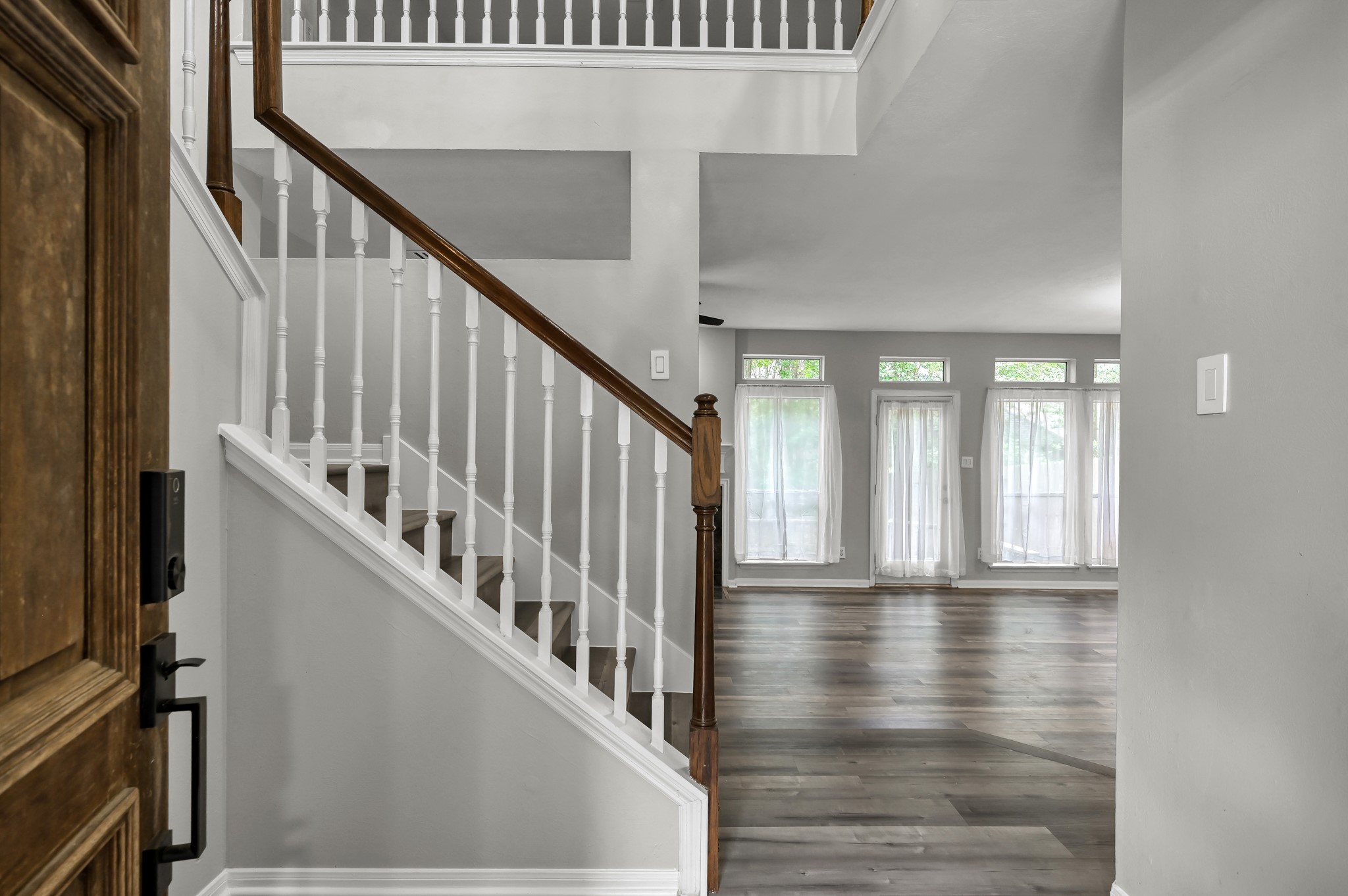 23 Alderon Woods Place Spring, TX 77382 - Photo 25 of 25 a view of an entryway with wooden floor