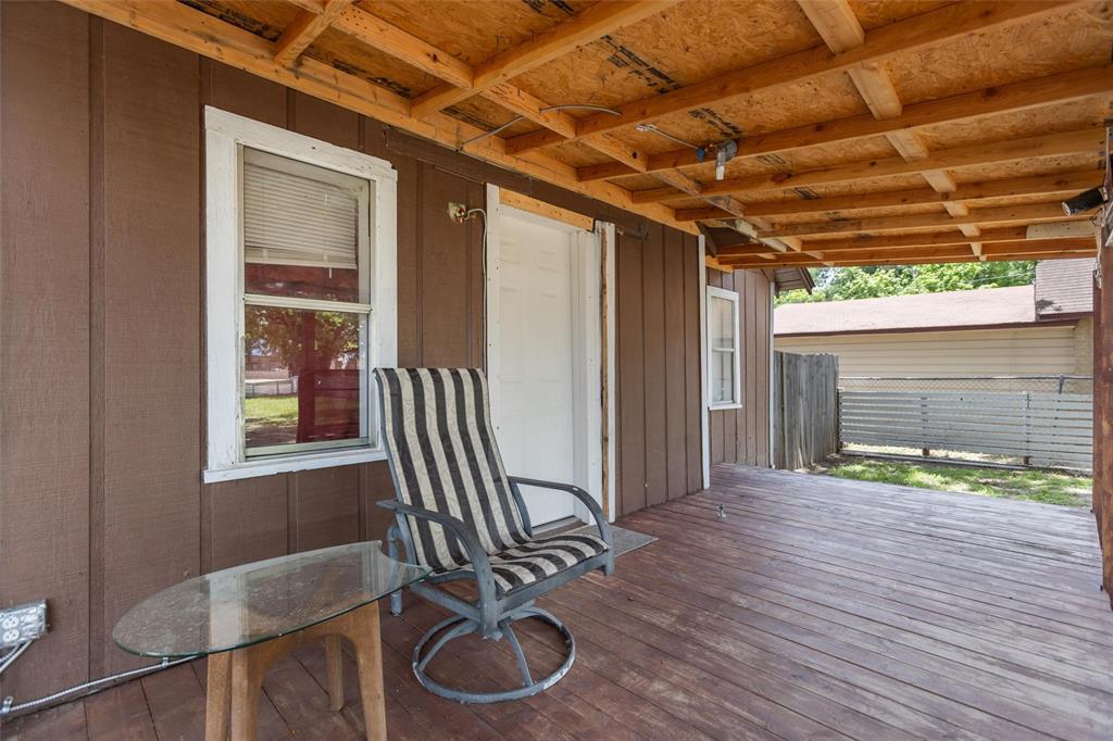 606 North Needmore Street Athens, TX 75751 - Photo 2 of 17 a backyard of a house with seating space
