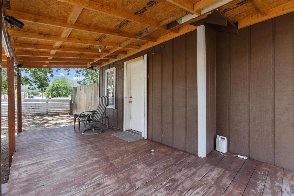 606 North Needmore Street Athens, TX 75751 - Photo 5 of 17 a view of a room with wooden floor and furniture