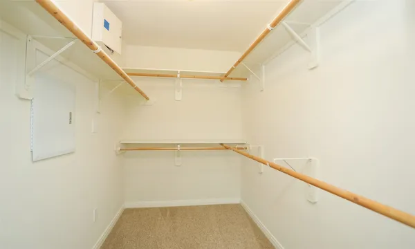 a view of an empty walk in closet