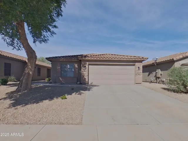 a view of a house with a patio