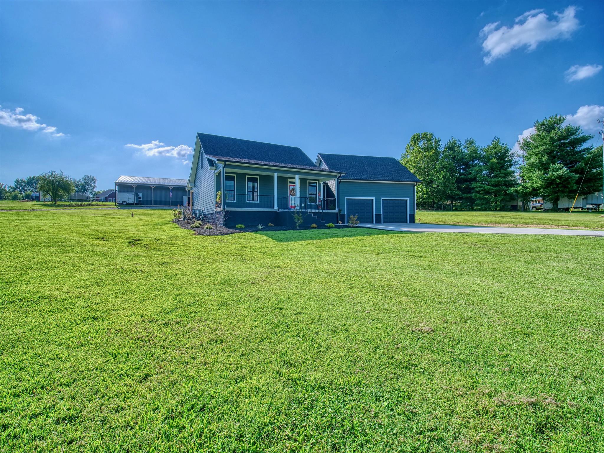 139 Mitchell Road Portland, TN 37148 - Photo 2 of 30 a view of a house with a big yard
