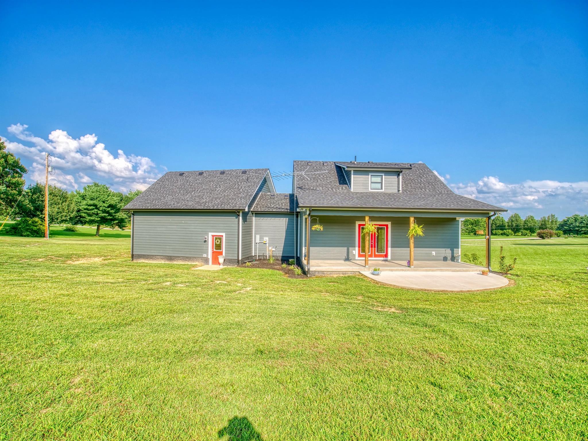 139 Mitchell Road Portland, TN 37148 - Photo 4 of 30 a front view of a house with a yard