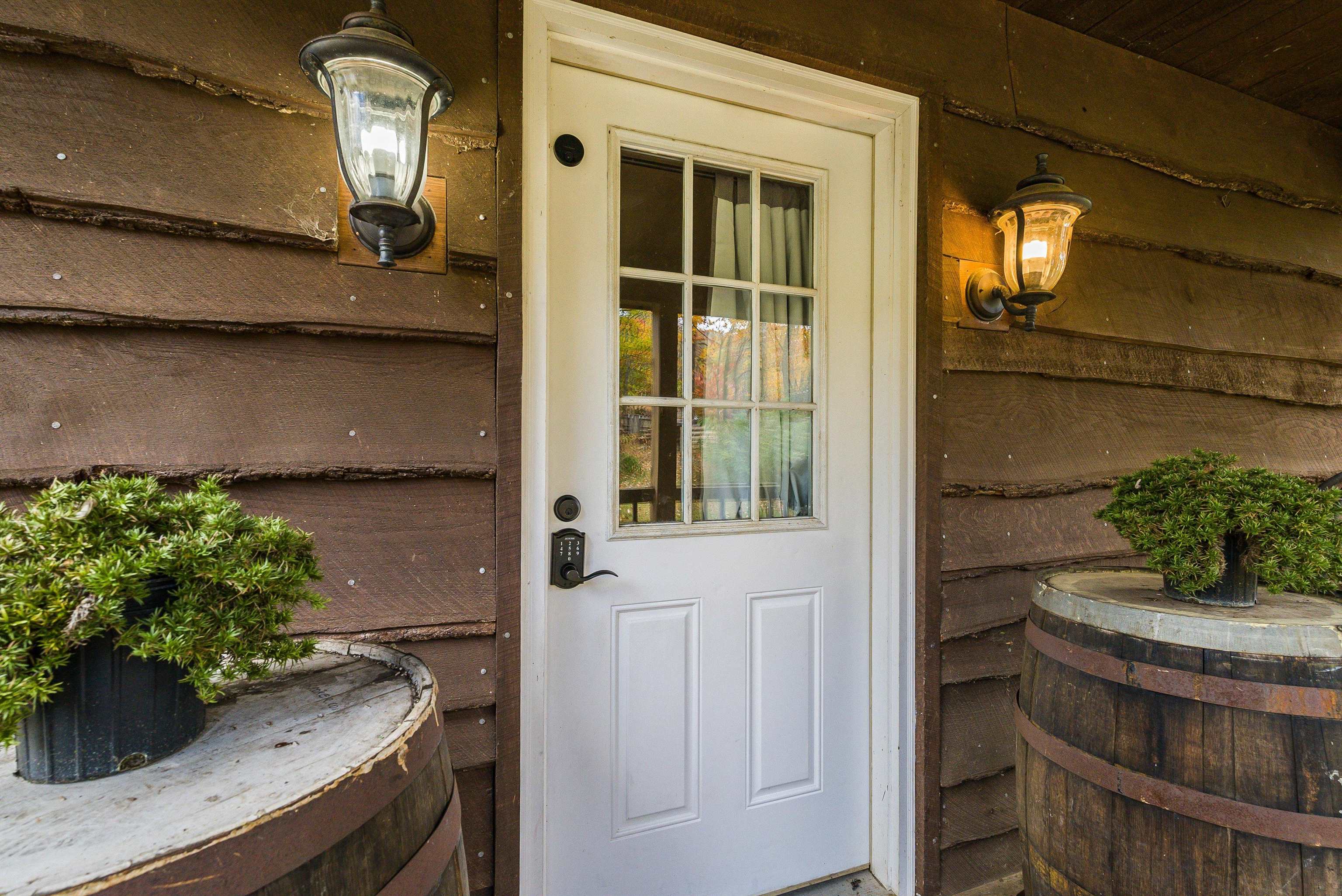 8499 Copperhead Road Singers Glen, VA 22850 - Photo 24 of 75 a view of potted plant in front of a door