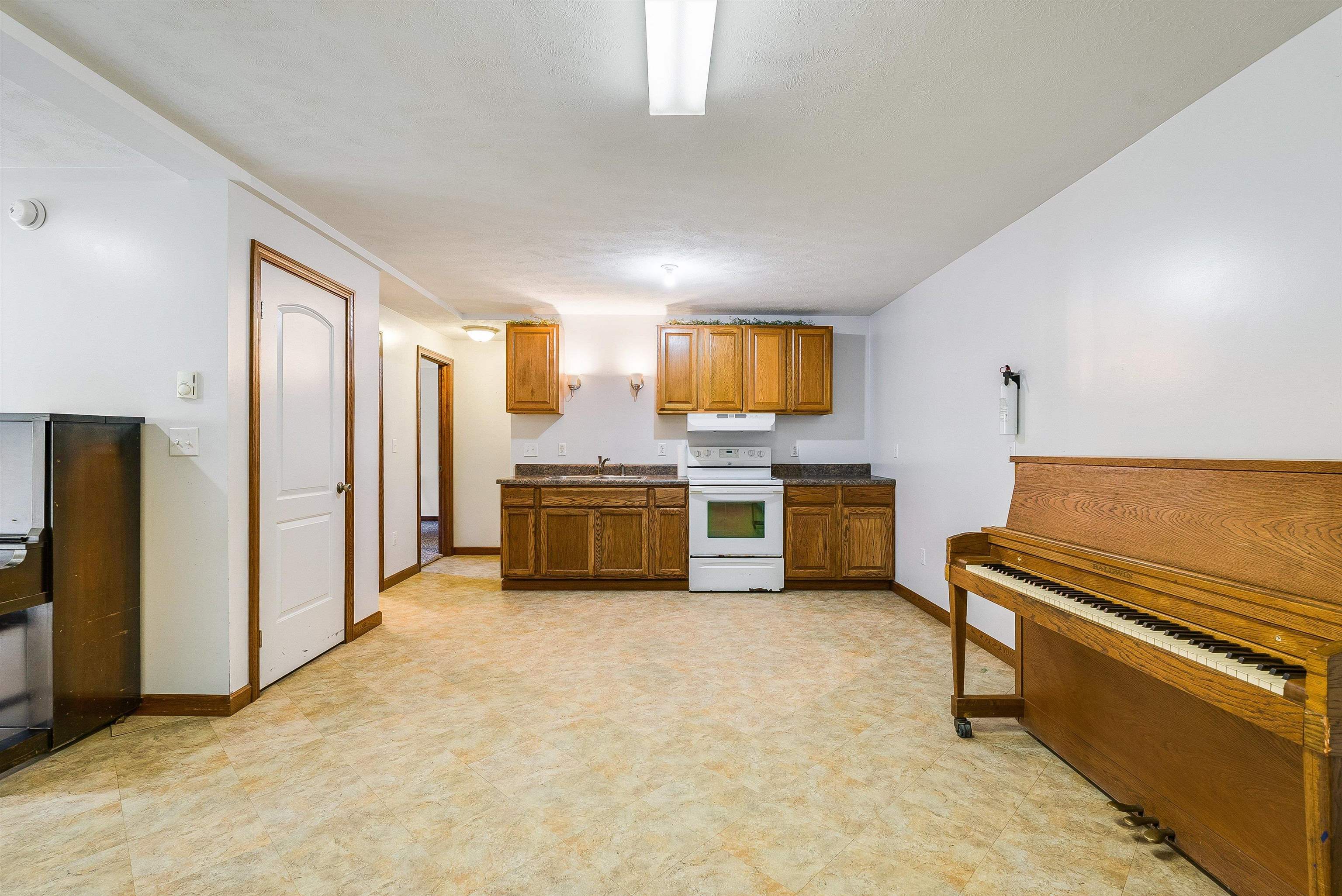 8499 Copperhead Road Singers Glen, VA 22850 - Photo 39 of 75 a kitchen with stainless steel appliances a stove a sink and a refrigerator