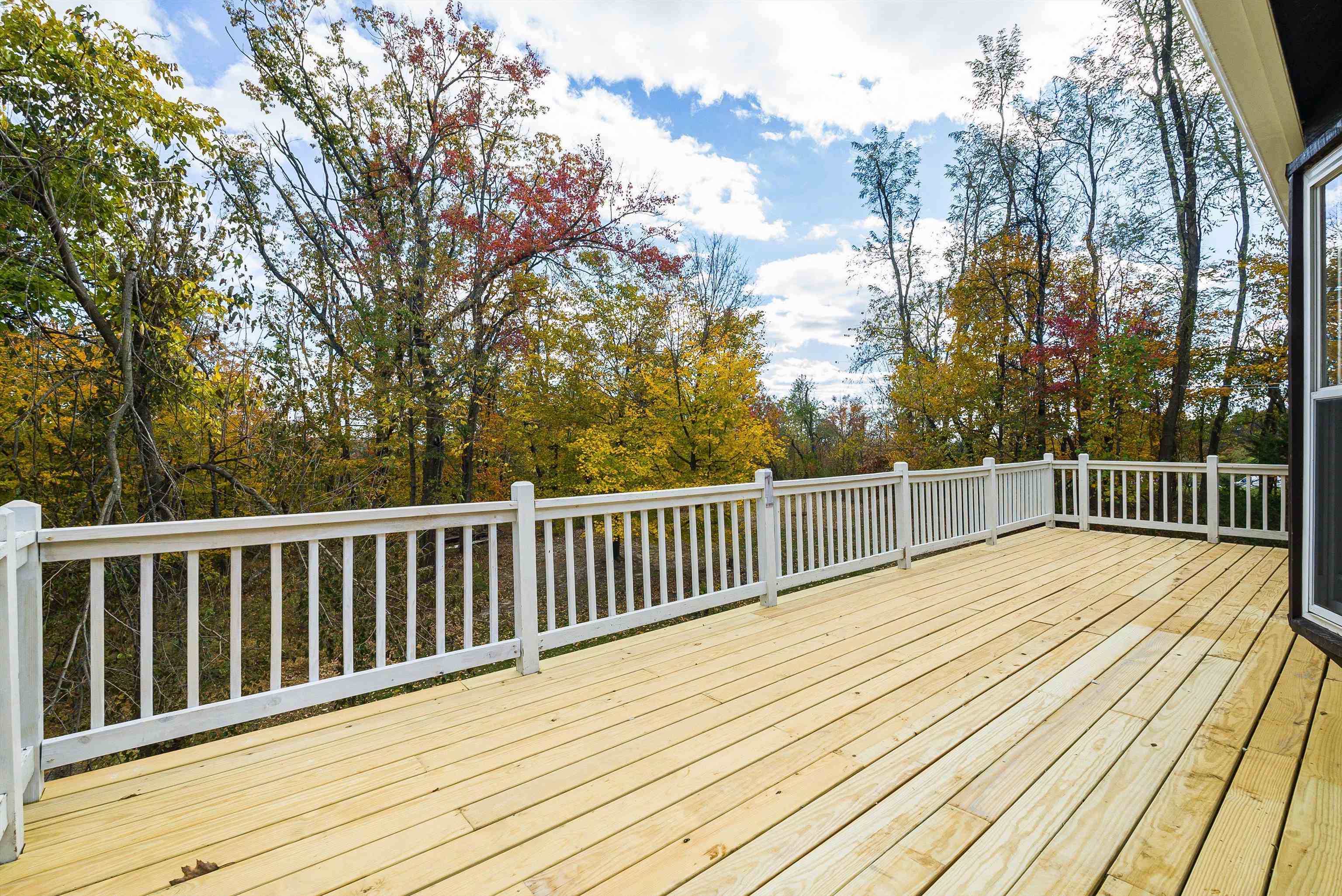 8499 Copperhead Road Singers Glen, VA 22850 - Photo 49 of 75 a view of balcony with wooden floor and fence