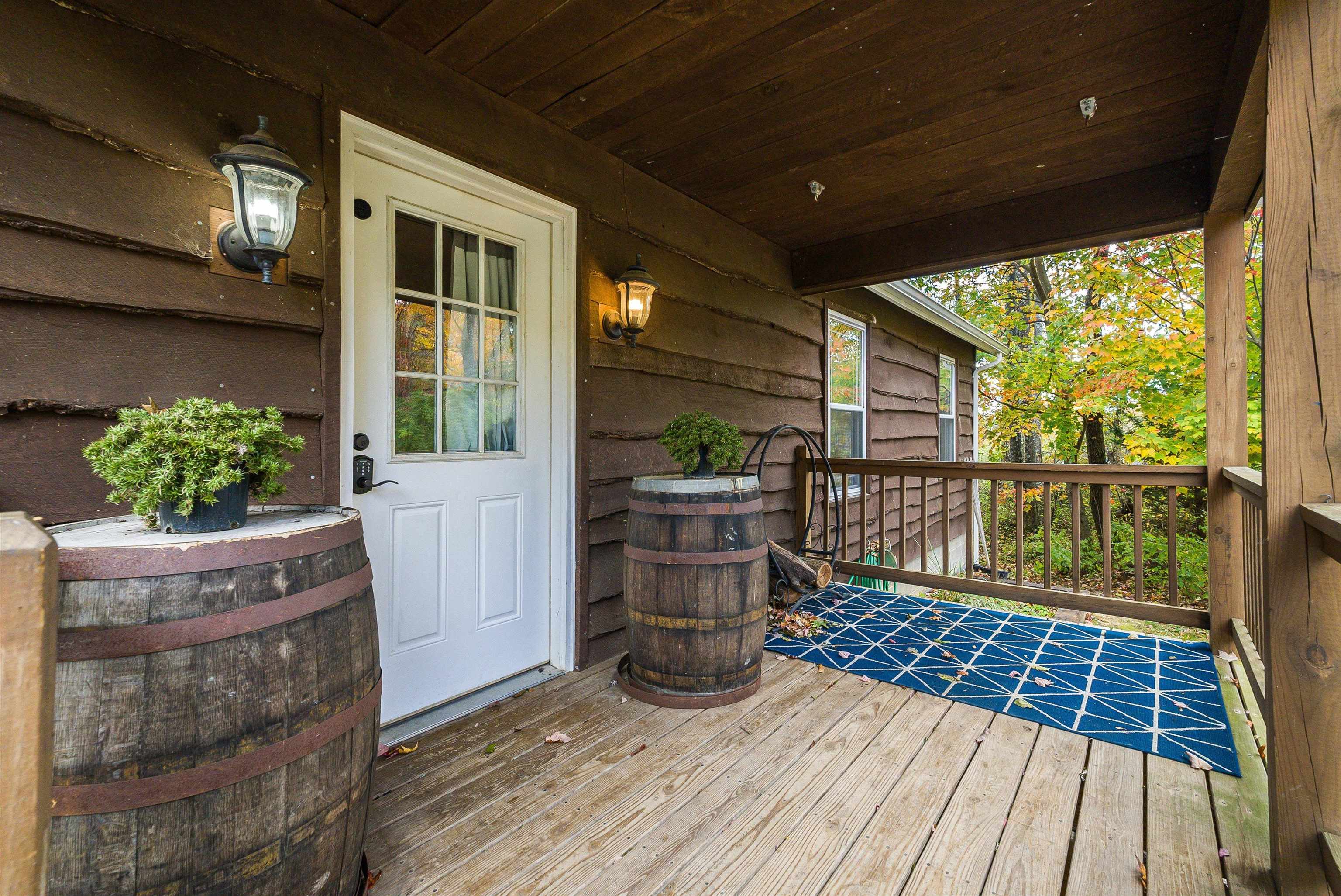 8499 Copperhead Road Singers Glen, VA 22850 - Photo 5 of 75 a view of a porch with wooden floor
