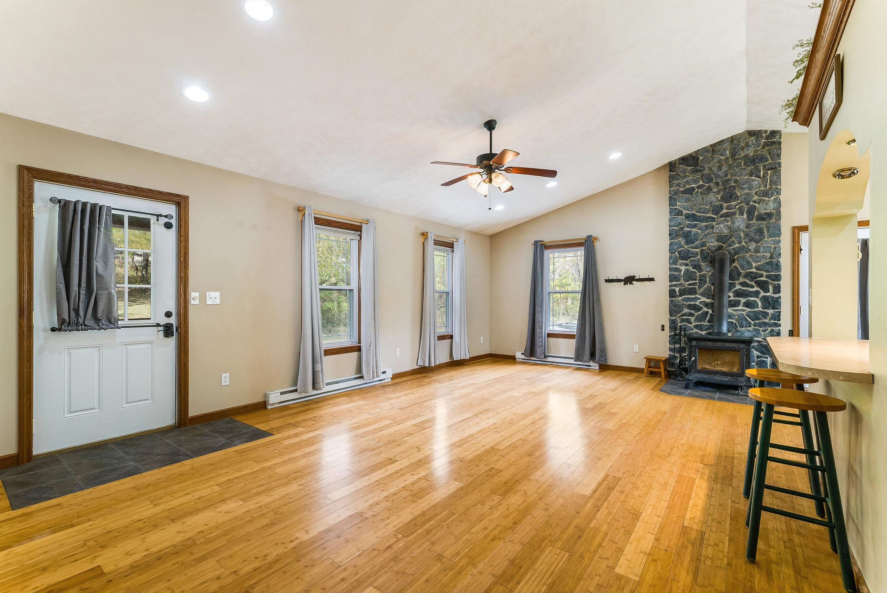 8499 Copperhead Road Singers Glen, VA 22850 - Photo 8 of 75 a view of an empty room with window and wooden floor
