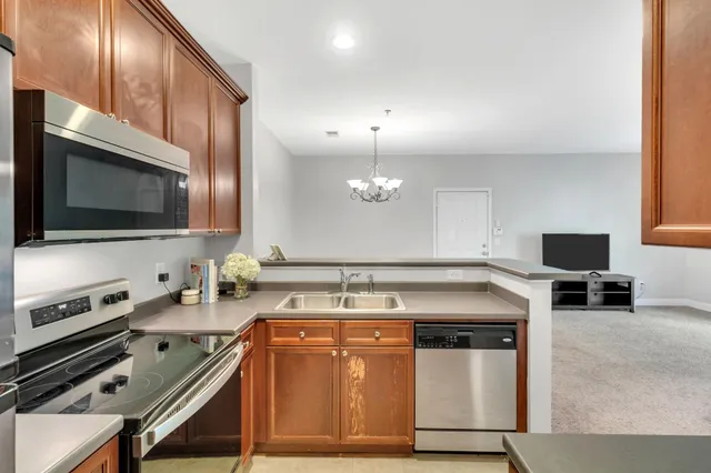 a kitchen with a stove and a microwave